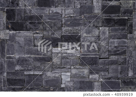 Seamless black stone wall texture background 48939919