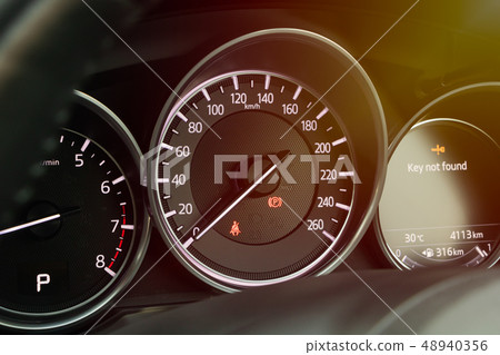 Speedometer Gauge on Dashboard in The Car Speedometer Gauge on Dashboard in The Car 48940356