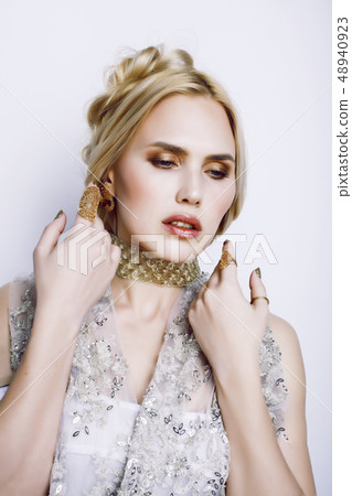 young pretty woman with party make up elegant dress on white background, bright people lifestyle young pretty woman with party make up elegant dress on white background, bright people lifestyle 48940923