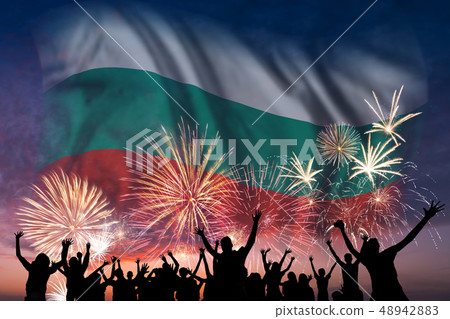 People are looking on fireworks and flag of People are looking on fireworks and flag of 48942883