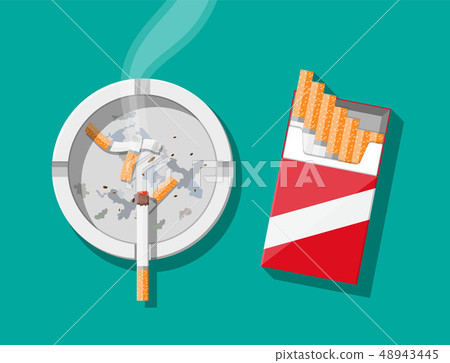 White ceramic ashtray full of smokes cigarettes. White ceramic ashtray full of smokes cigarettes. 48943445