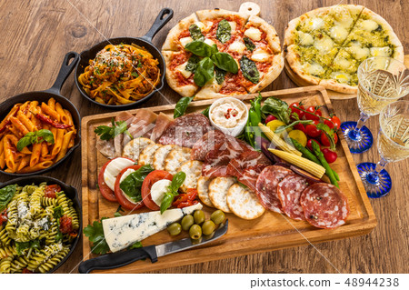 Cheese, wine and ham hors d'oeuvres Ham and cheese and wine Cheese, wine and ham hors d'oeuvres Ham and cheese and wine 48944238