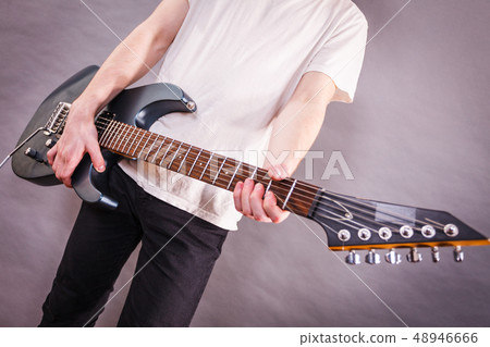 Close up on guitar fretboard 48946666