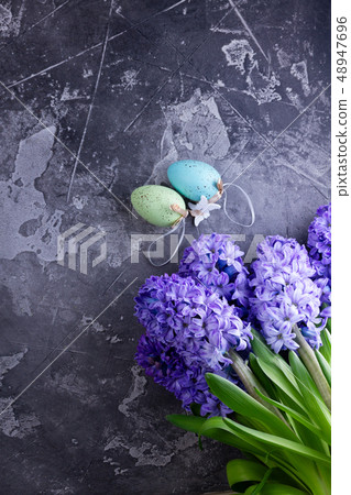 Easter scene with colored eggs Easter scene with colored eggs 48947696