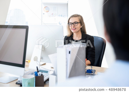 Happy businesswoman working with computer in the Happy businesswoman working with computer in the 48948678