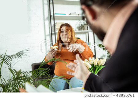 Serious young woman suffering bulimia since childhood 48950761