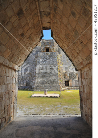 Uxmal Archaeological Site Pyramid of the Sorcerer from the Maya Arch (Mexico) Uxmal Archaeological Site Pyramid of the Sorcerer from the Maya Arch (Mexico) 48951217