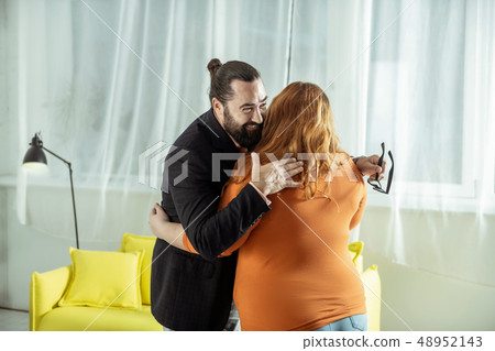 Worried overweight girl embracing her best friend Worried overweight girl embracing her best friend 48952143