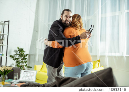 Emotional male person being in all ears Emotional male person being in all ears 48952146