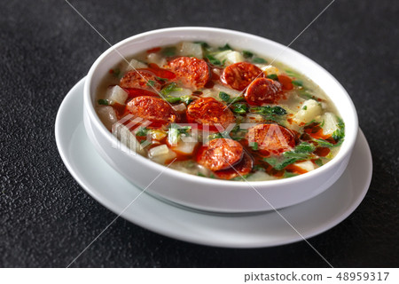 Portion of Caldo verde soup Portion of Caldo verde soup 48959317