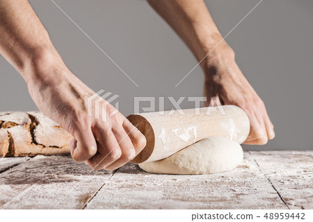 Chef making and kneading fresh dough Chef making and kneading fresh dough 48959442