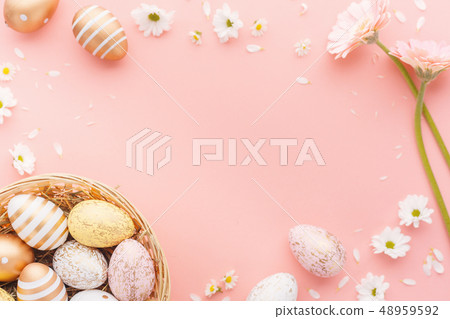 Easter Flat Lay of Eggs with flowers on pink Easter Flat Lay of Eggs with flowers on pink 48959592