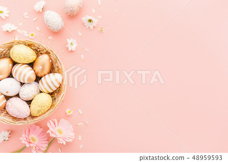 Easter Flat Lay of Eggs with flowers on pink Easter Flat Lay of Eggs with flowers on pink 48959593