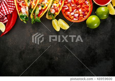 Tasty appetizing tacos with vegetables Tasty appetizing tacos with vegetables 48959600