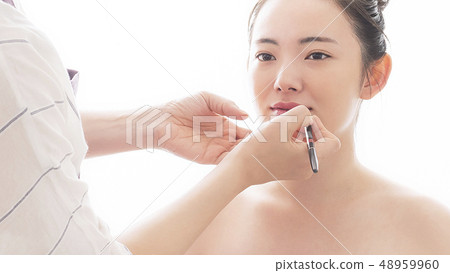 Beauty image of young woman Lip cosmetics Beauty image of young woman Lip cosmetics 48959960