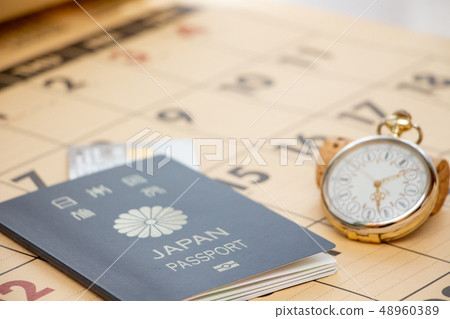 Passport and calendar travel plan image 48960389