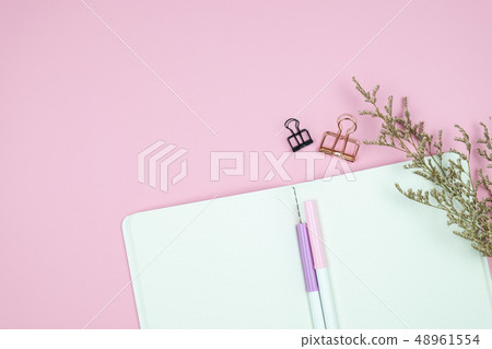 Top view of notebook stationery and flower Top view of notebook stationery and flower 48961554
