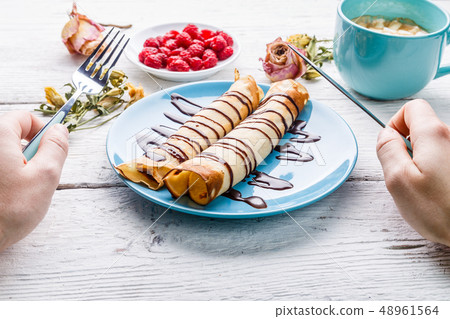 Image of man with pancakes 48961564