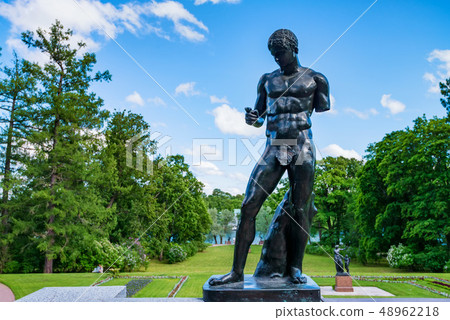 Granite statue of antique man in Tsarskoye Selo, Russia 48962218