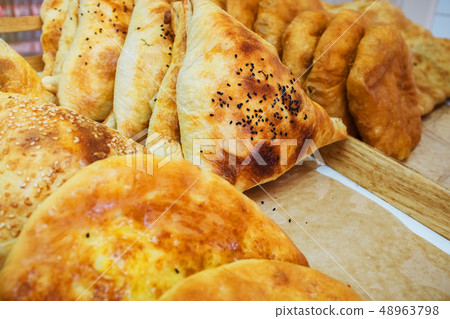 Close up Delicious Homemade samosas isolated on white Plate Vegetarian Nigerian Samosas Close up Delicious Homemade samosas isolated on white Plate Vegetarian Nigerian Samosas 48963798