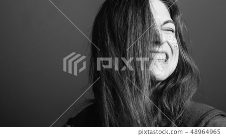 woman grimacing rage facial expression bared teeth woman grimacing rage facial expression bared teeth 48964965