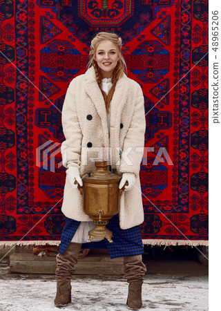 Russian beautiful girl at winter countryside Russian beautiful girl at winter countryside 48965206