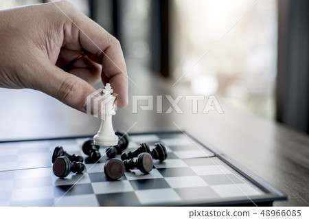 Hands of confident businessman colleagues playing 48966085