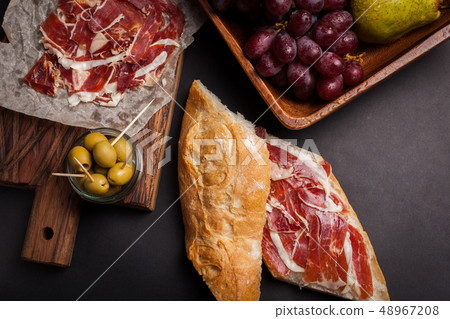 Jamon Iberico with white bread. Jamon Iberico with white bread. 48967208