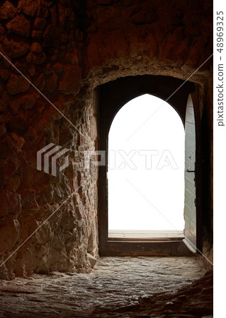 Passage of an old castle, open door Passage of an old castle, open door 48969325