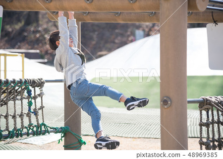 Children enjoying athletics 48969385