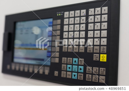 control panel and screen of CNC-operated machine control panel and screen of CNC-operated machine 48969851