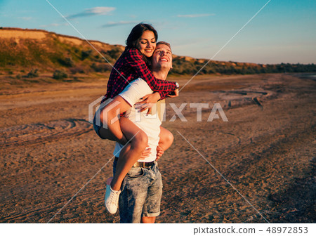 lovestory of couple on the beach On the Sunset lovestory of couple on the beach On the Sunset 48972853