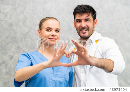 Doctor and nurse working in hospital. 48973404
