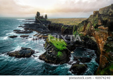 Londrangar in Snaefellsnes National Park, Iceland. Londrangar in Snaefellsnes National Park, Iceland. 48974240