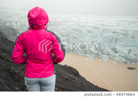 Traveler travel Svinafellsjokull Glacier, Iceland. 48974664