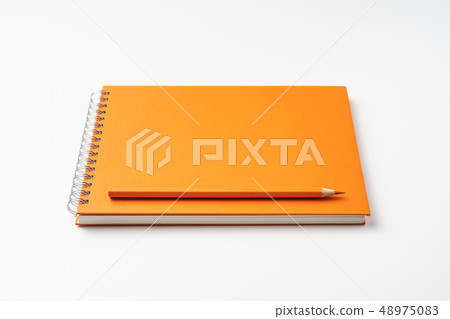 perspective view of spiral orange notebook 48975083