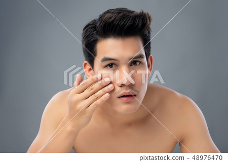 Portrait of shirtless young handsome Asian man 48976470
