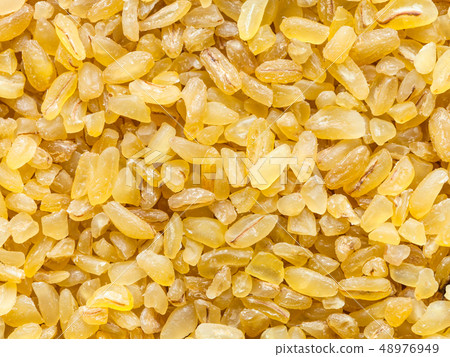 bulgur (burghul) wheat grains close up bulgur (burghul) wheat grains close up 48976949