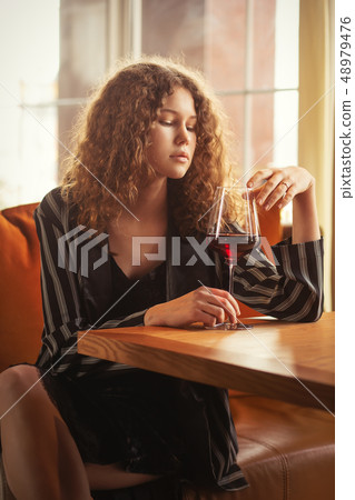 woman in restaurant woman in restaurant 48979476
