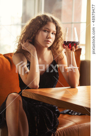 woman in restaurant woman in restaurant 48979477