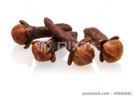 Dry clove buds isolated on white Dry clove buds isolated on white 48980682