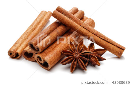 Cinnamon sticks and star anise isolated on white Cinnamon sticks and star anise isolated on white 48980689