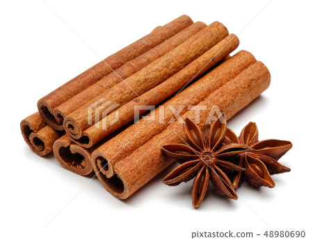 Cinnamon sticks and star anise isolated on white Cinnamon sticks and star anise isolated on white 48980690