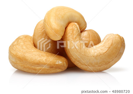 Roasted cashew nuts isolated on white Roasted cashew nuts isolated on white 48980720