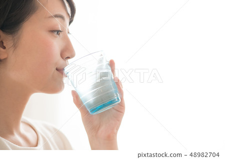 Young Japanese Woman Drinking Glass of Water Hydration Young Japanese Woman Drinking Glass of Water Hydration 48982704