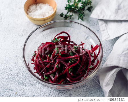 Raw beetroot noodles or beet spaghetti Raw beetroot noodles or beet spaghetti 48984181