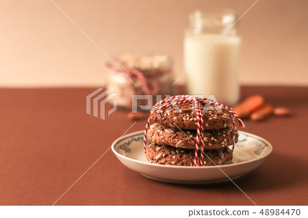 Homemade oatmeal cookies on old table  48984470