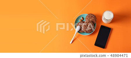 Oatmeal cookies with nuts on a plate 48984471