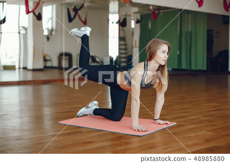 girl in a gym girl in a gym 48985880