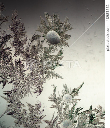 Icy stains on the glass as a background Icy stains on the glass as a background 48985881